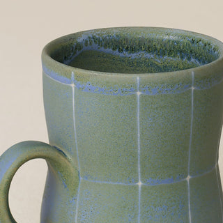 Close-up details of hand-thrown mug by Rookwood