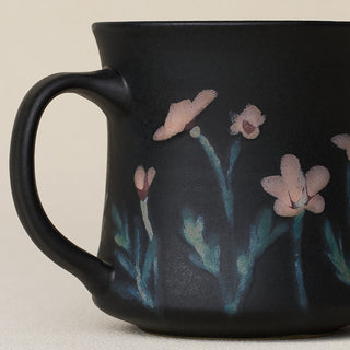 Close-up details of hand-thrown mug by Rookwood