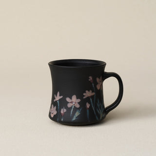 Hand-thrown ceramic mug by Rookwood Pottery