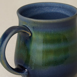 Close-up details of hand-thrown mug by Rookwood