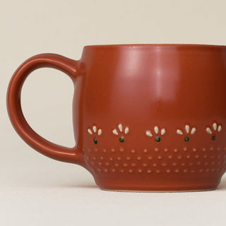 Close-up details of hand-thrown mug by Rookwood