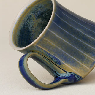 Close-up details of hand-thrown mug by Rookwood