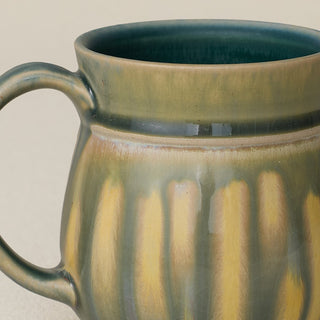 Close-up details of hand-thrown mug by Rookwood