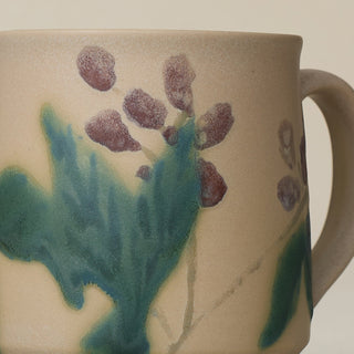 Close-up details of hand-thrown mug by Rookwood