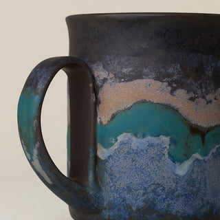 Close-up details of hand-thrown mug by Rookwood