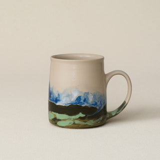 Hand-thrown ceramic mug by Rookwood Pottery