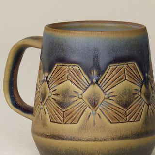 Close-up details of hand-thrown mug by Rookwood