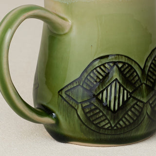 Close-up details of hand-thrown mug by Rookwood