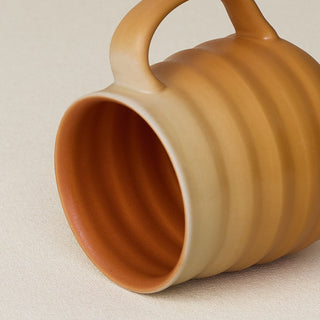 Close-up details of hand-thrown mug by Rookwood