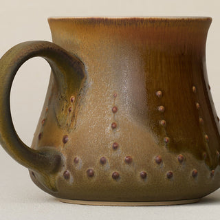 Close-up details of hand-thrown mug by Rookwood