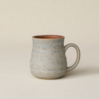 Hand-thrown ceramic mug by Rookwood Pottery