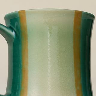 Close-up details of hand-thrown mug by Rookwood