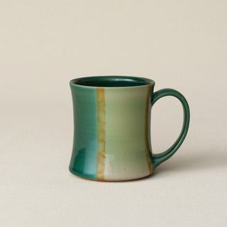 Hand-thrown ceramic mug by Rookwood Pottery