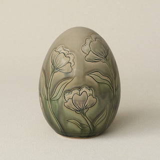 Handcrafted ceramic egg by Rookwood Pottery