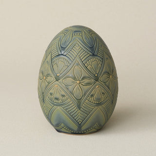 Handcrafted ceramic egg by Rookwood Pottery