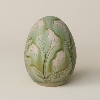 Handcrafted ceramic egg by Rookwood Pottery