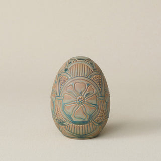 Handcrafted ceramic egg by Rookwood Pottery