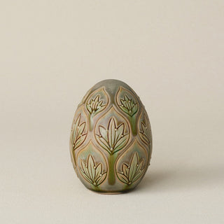Handcrafted ceramic egg by Rookwood Pottery