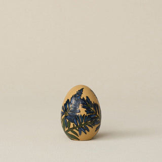 Handcrafted ceramic egg by Rookwood Pottery