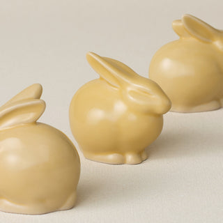 Three small ceramic bunny rabbit figurines, made in Cincinnati, OH
