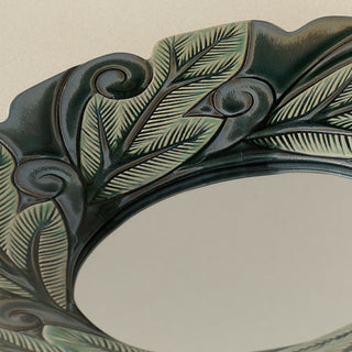 Close-up details of the one-of-a-kind mirror.