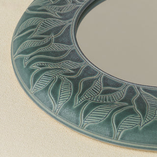 Close-up details of the one-of-a-kind mirror.