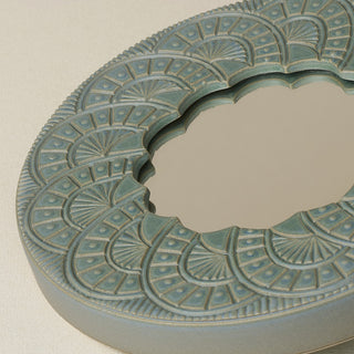 Close-up details of the one-of-a-kind mirror.