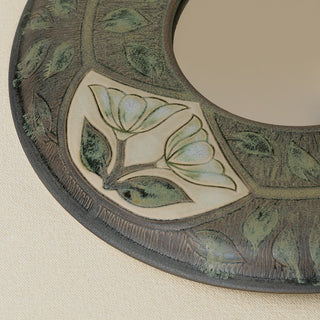 Close-up details of the one-of-a-kind mirror.