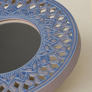 Close-up details of the one-of-a-kind mirror.