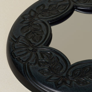 Close-up details of the one-of-a-kind mirror.