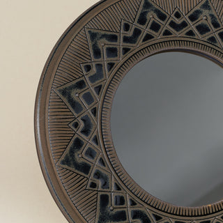 Close-up details of the one-of-a-kind mirror.