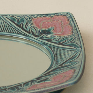 Close-up details of the one-of-a-kind mirror.