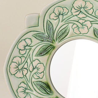 Close-up details of the one-of-a-kind mirror.