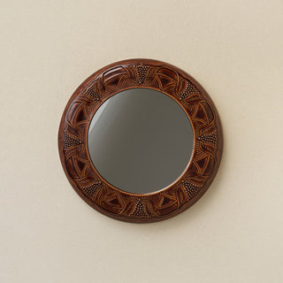 Hand-thrown and hand-glazed ceramic wall mirror by Rookwood Pottery