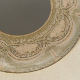 Close-up details of the one-of-a-kind mirror.