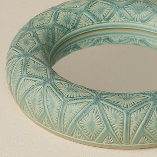 Close-up details of the one-of-a-kind mirror.