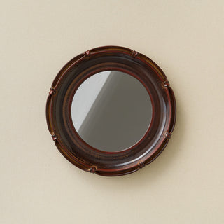 Hand-thrown and hand-glazed ceramic wall mirror by Rookwood Pottery