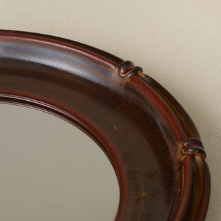 Close-up details of the one-of-a-kind mirror.