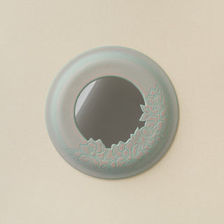 Hand-thrown and hand-glazed ceramic wall mirror by Rookwood Pottery