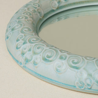 Close-up details of the one-of-a-kind mirror.