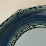 Close-up details of the one-of-a-kind mirror.