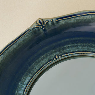 Close-up details of the one-of-a-kind mirror.