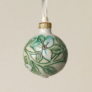 Intricately carved and glazed ceramic globe ornament with ivory satin ribbon –