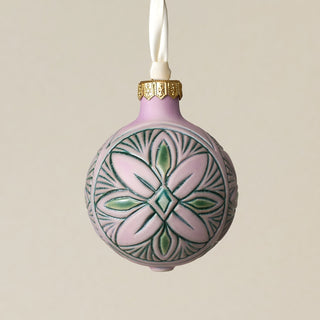 Intricately carved and glazed ceramic globe ornament with ivory satin ribbon –