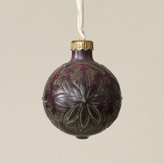 Intricately carved and glazed ceramic globe ornament with ivory satin ribbon –