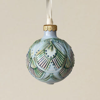 Intricately carved and glazed ceramic globe ornament with ivory satin ribbon –