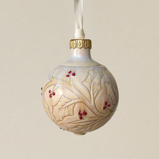 Intricately carved and glazed ceramic globe ornament with ivory satin ribbon –