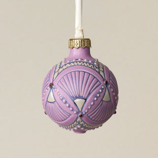 Intricately carved and glazed ceramic globe ornament with ivory satin ribbon –