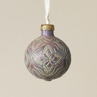 Intricately carved and glazed ceramic globe ornament with ivory satin ribbon –