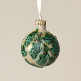 Intricately carved and glazed ceramic globe ornament with ivory satin ribbon –